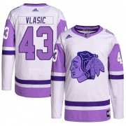 Adidas Chicago Blackhawks 43 Alex Vlasic Authentic White/Purple Hockey Fights Cancer Primegreen Youth NHL Jersey