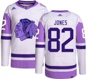 Adidas Chicago Blackhawks 82 Caleb Jones Authentic Hockey Fights Cancer Men's NHL Jersey